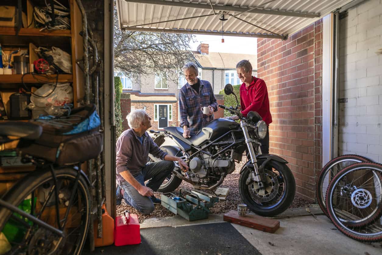 Men working on new motorcycle